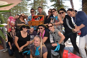 Treasure Hunt Teams Smiling with Treasure chest